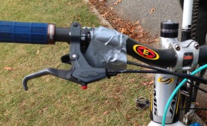 Kristine Contento-Angell duct tape the bike together